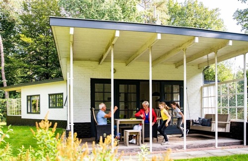 Norg House | Monumental 4-person bungalow, built under the architecture of the Amsterdam School with unique details.