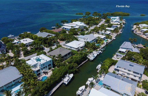 Indian Waterways House | Morada Breeze ~ 6 Bedroom Plantation Key Home with Pool & Dockage