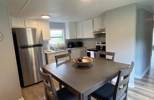 West Jefferson House | Morning SideView-Charming 2-bedroom mobile home with WiFi, AC in West Jefferson.