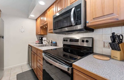 Estes Park Condo | Mountain Pines Chalet: Nestled along Fall River