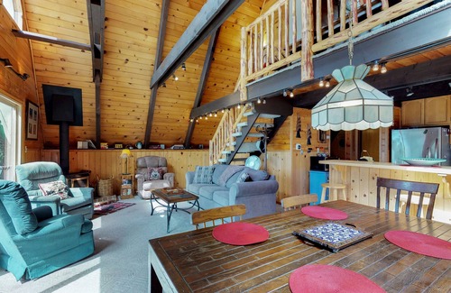 Arnold Cabin | Mountain-view, dog-friendly A-frame cabin with pool & forest-view deck