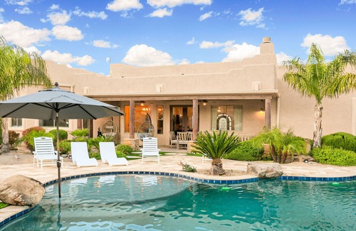 Anthem House | Mountain-view stay with sprawling outdoor space, pool, hot tub, & putting green