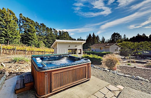 Freestone Cottage | Mountain-view vineyard cottage with private hot tub, dining deck