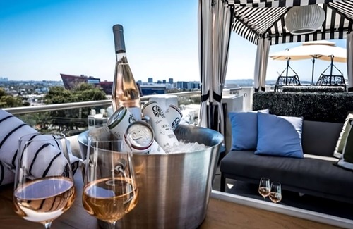 Norma Triangle Apartment | Movie Night at the Comedy Store, Panoramic View of LA skyline from the Terrace