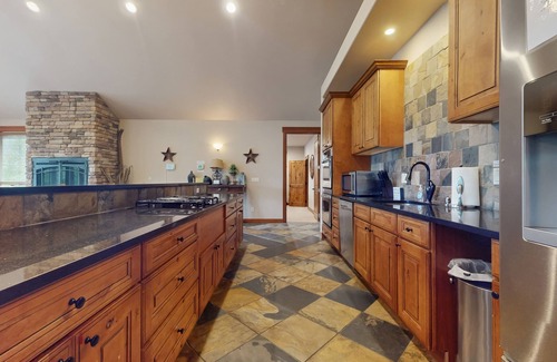 Cle Elum Cabin | Mtn-view cabin with private hot tub, game room, firepit, large deck, fireplaces