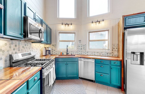 Manchester House | Mtn-view dog-friendly home with private hot tub, fireplace, patio, & grill
