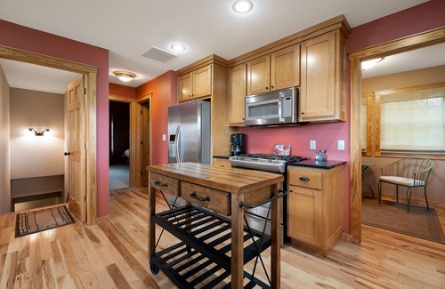 Eureka Springs House | Multi-level home with a game room, washer/dryer, fireplace, deck & central AC