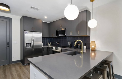 Rolling Mill Hill Condo | Muse | City-view condo with central AC, balcony & onsite gym