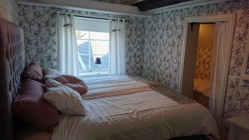 Borlange Cabin | Myntloftet med inglasad bubbelbad