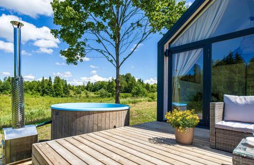 Renavas Cabin | Namelis prie raisto