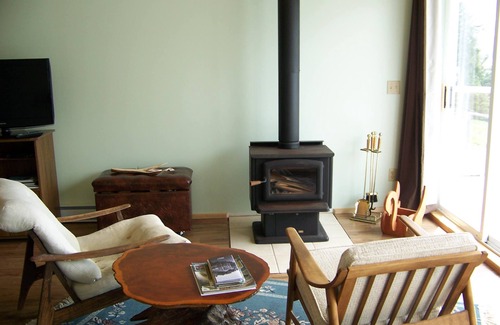 Malcolm Island House | Nature Seafront View