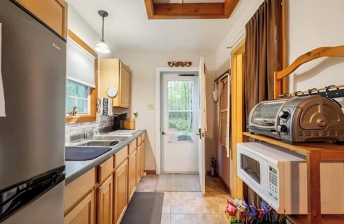 Cambridge Cottage | nCozy retreat in peaceful wooded setting. Pet friendly!