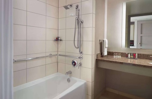 Downtown Hotel | Near Red Hat Amphitheater + Dining. Pool. Gym.