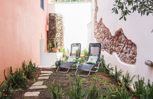 Exarhia Apartment | Neoclassical house with garden in the center of Athens.