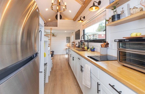 Alexander House | Nestled in the mountains, this cozy tiny home is 15 minutes to Asheville.