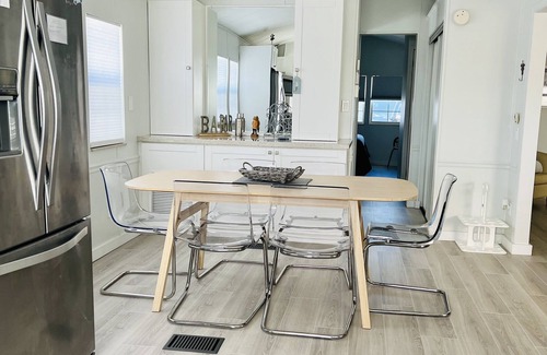 Hutchinson Island South Cottage | Nettles Island Waterfront with Dock & steps from Beach-plus Golf Cart Credit
