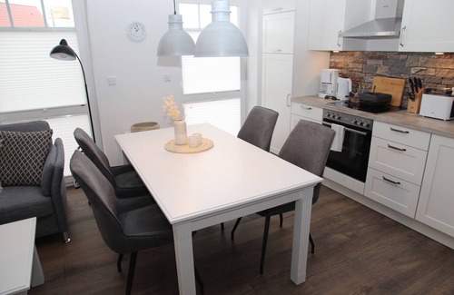 Greetsiel Apartment | Neubauwohnung mit Hund für bis zu 4 Personen im Greetsieler Grachtenpark