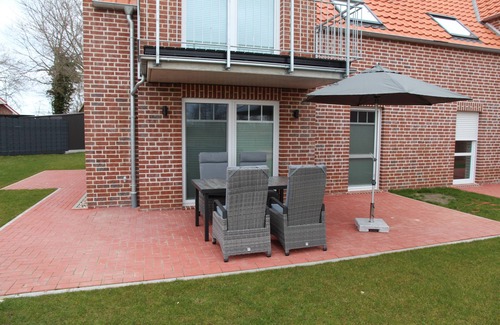 Greetsiel Apartment | Neubauwohnung mit Hund für bis zu 4 Personen im Greetsieler Grachtenpark