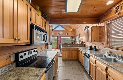 Gatlinburg - Pigeon Forge Cabin | New! 2BR Resort Cabin w/MTN Views! Hot Tub*Games