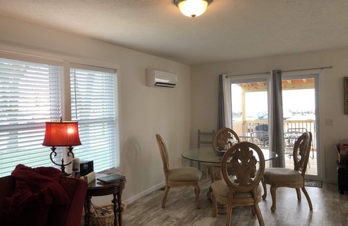 Oak Harbor House | New! 30 seconds from couch to shore, covered front porch w/sunset water views.