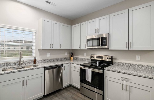Grandville Condo | New Build 4BR 4BA Two Condo w Garage and Patio