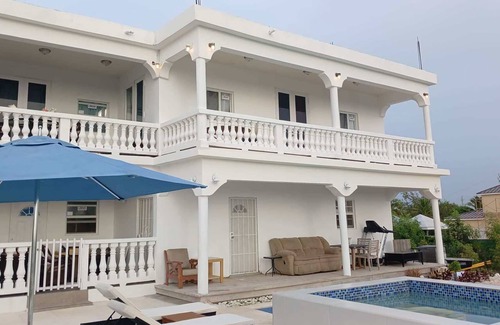 Wheeland Settlement Apartment | New condo with sea view (unit 1)