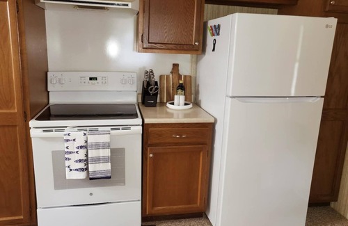 Kalkaska Cottage | New! Forrest’s Cabin - Lakefront with Sunset Views and Private Dock!