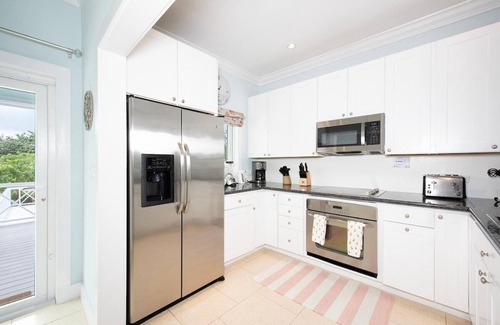 Governor's Harbour House | New Home w/Heated Pool on Prestigious Banks Rd