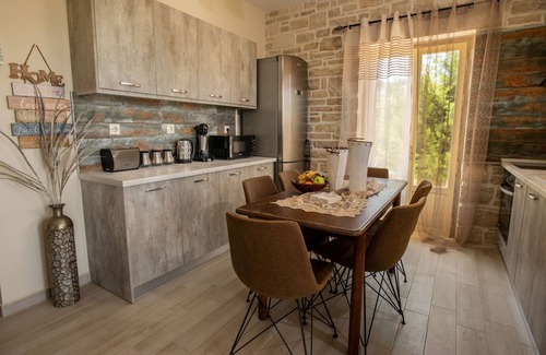 Neo Kalamaki House | New July 2020: Beautiful modern stone house, garden, on the beach