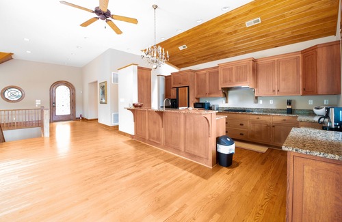Sandston House | NEW LISTING! Hidden Waterfront Luxury Oasis with 9-Acre Pond by RedAwning