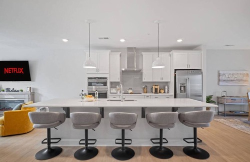Wake Forest Condo | New Luxury Condo w/Rooftop Terrace, EV Charger, Walk to Downtown Wake Forest!