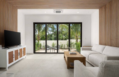 Grace Bay House | New Modern Seascape Townhome #14 in Tropical Grace Bay!