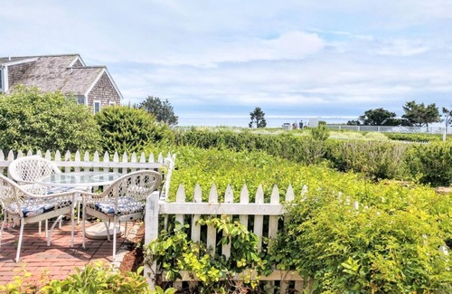 Mashpee Cottage | New Seabury cottage, stunning ocean views, steps to private beach in maushop