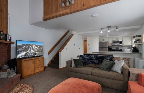 West Dover Condo | NEW Ski in/out condo with Mt views, hot tub, porch, gym & wifi!