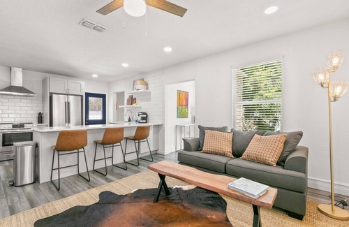 Courier City - Oscawana Apartment | NEW! SoHo Sanctuary - Gorgeous Apartment Steps to S Howard Ave with Fenced Yard