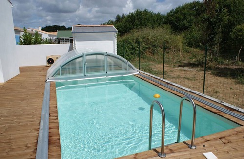 Le Chateau-d'Oleron House | New villa with private heated pool and sliding shelter at Château d'Oléron