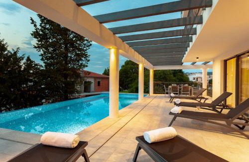 Malinska-Dubasnica Villa | New villa with large pool, sea view, 300 m from the beach - by TRAVELER tourist agency Krk - ID 2191