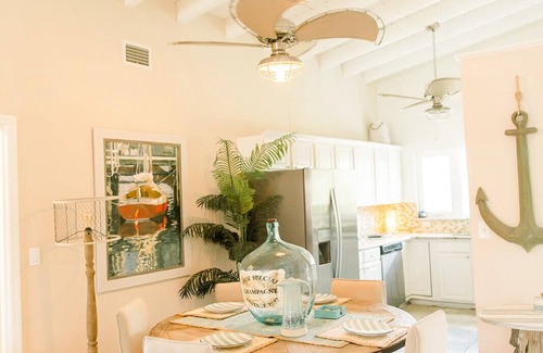 Royal Harbor Condo | New! Waterfront, 1/2 block to Naples Bay, Bike! Private Doc! Pet Friendly!