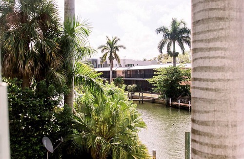 Royal Harbor Condo | New! Waterfront, 1/2 block to Naples Bay, Bike! Private Doc! Pet Friendly!