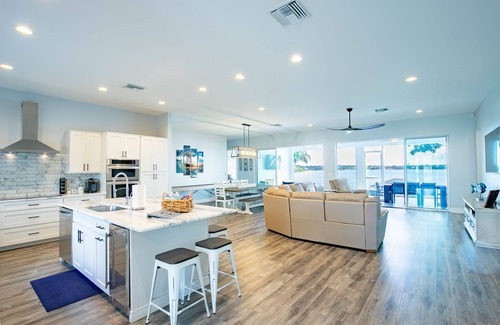 Lake Placid House | Newer Home on Lake June with Beach, Dock, Screened Patio and Hot Tub!