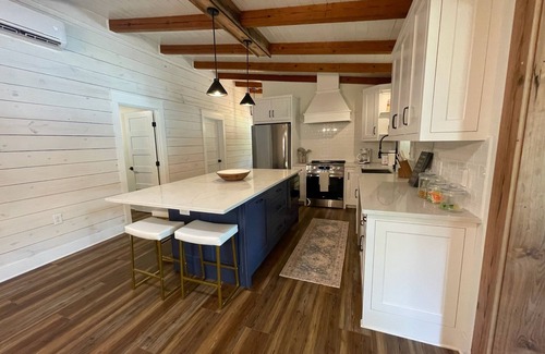 Dadeville Cabin | Newly renovated lakefront cabin at Lake Martin! Dock and boat ramp onsite!