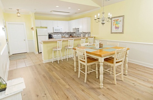 Central Myrtle Beach Condo | Newly Renovated Top Floor Condo with Pool, Golf Course View-1 mile to the beach!