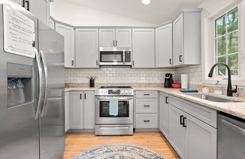Kenyon House | Newly renovated cottage 5 minute drive to several beaches. Great location!