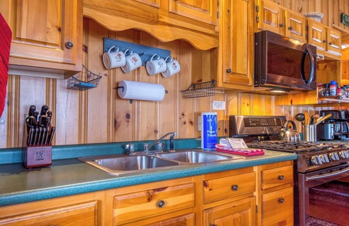 Rangeley Plantation Cabin | Niboban Cabin 5 right on Rangeley Lake with a screened porch, fire pit, hammock, WiFi and dock!
