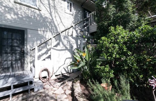 Golden Hill Apartment | Nice 1 bedroom apartment set up with 2 queen beds with one in the living room. The kitchen and bar area still provide ample space and can accommodate up to 5 people.