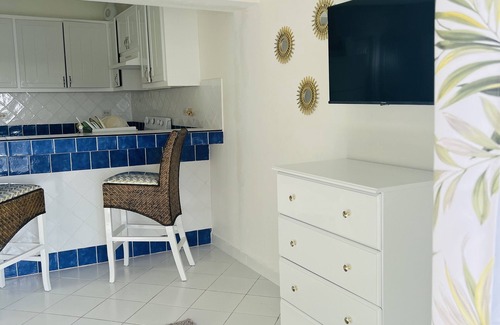 Maho Apartment | Nice and cozy ocean front studio with private terrace. Short walk to beaches.