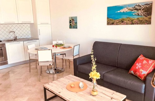 Porto Pozzo Apartment | Nice apartment for 4 guests with A/C, WIFI, pool, TV, terrace and pets allowed