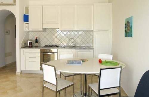 Porto Pozzo Apartment | Nice apartment for 4 guests with A/C, WIFI, pool, TV, terrace and pets allowed