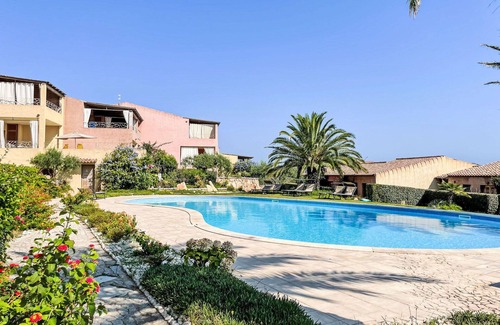 Porto Pozzo Apartment | Nice apartment for 4 guests with A/C, WIFI, pool, TV, terrace and pets allowed