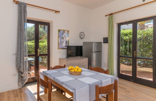 Capo Testa Apartment | Nice apartment for 4 people with A/C, TV, terrace, pets allowed and parking